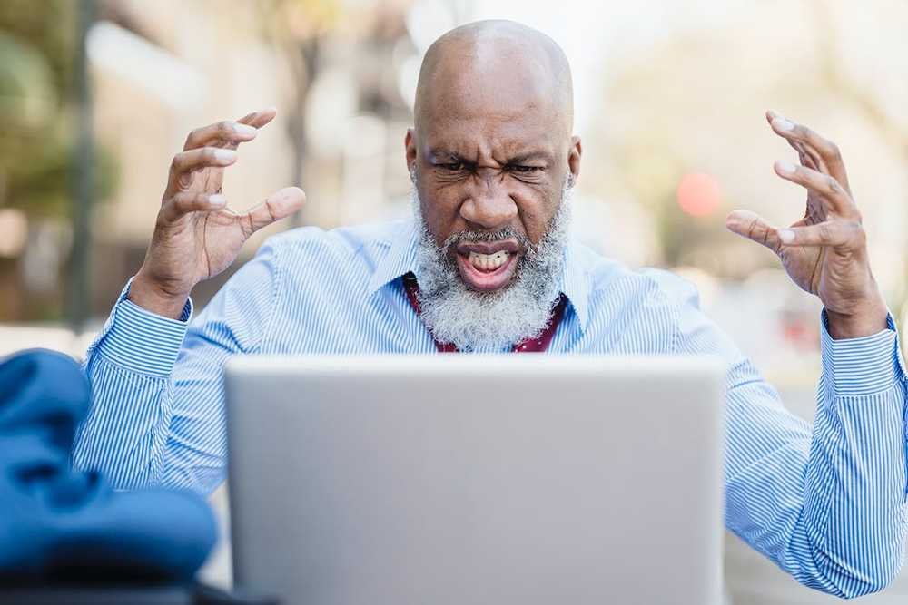 A angry man with a laptop